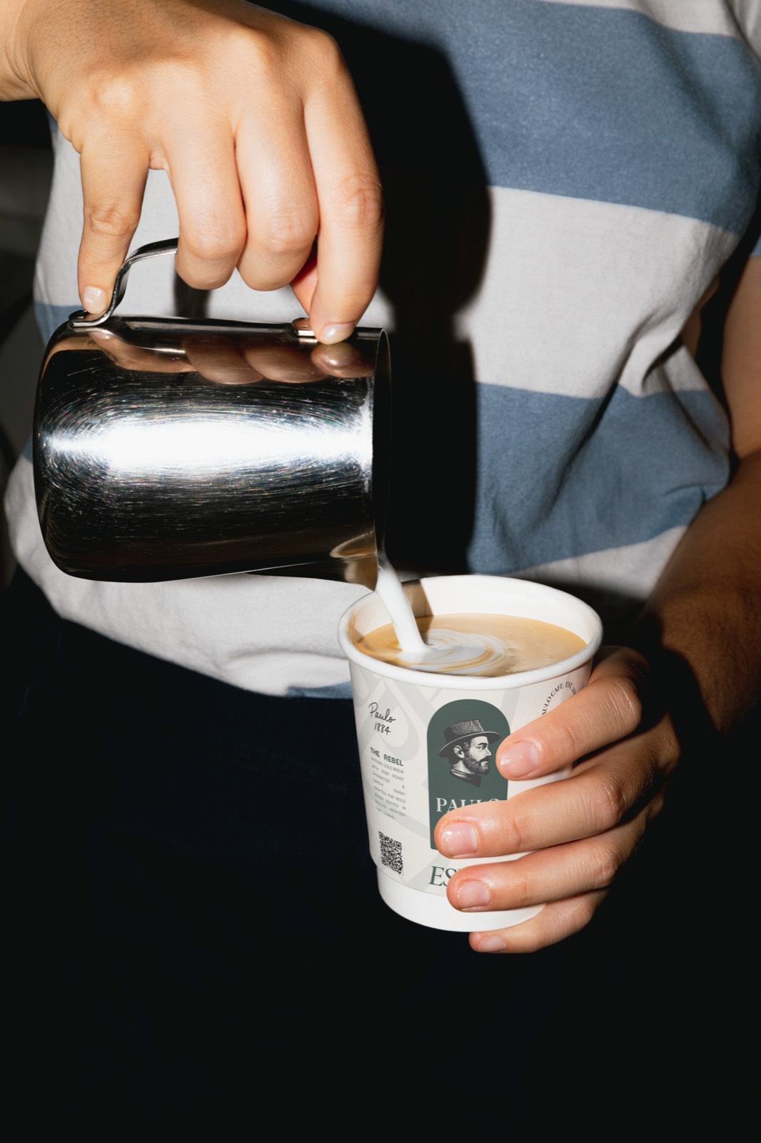 Pouring milk into a Paulo latte